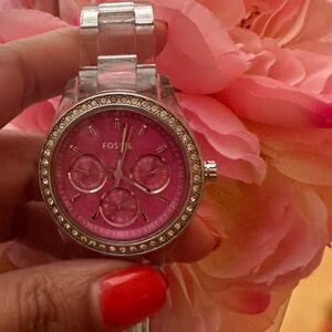 Fossil women’s watch with pink face plate